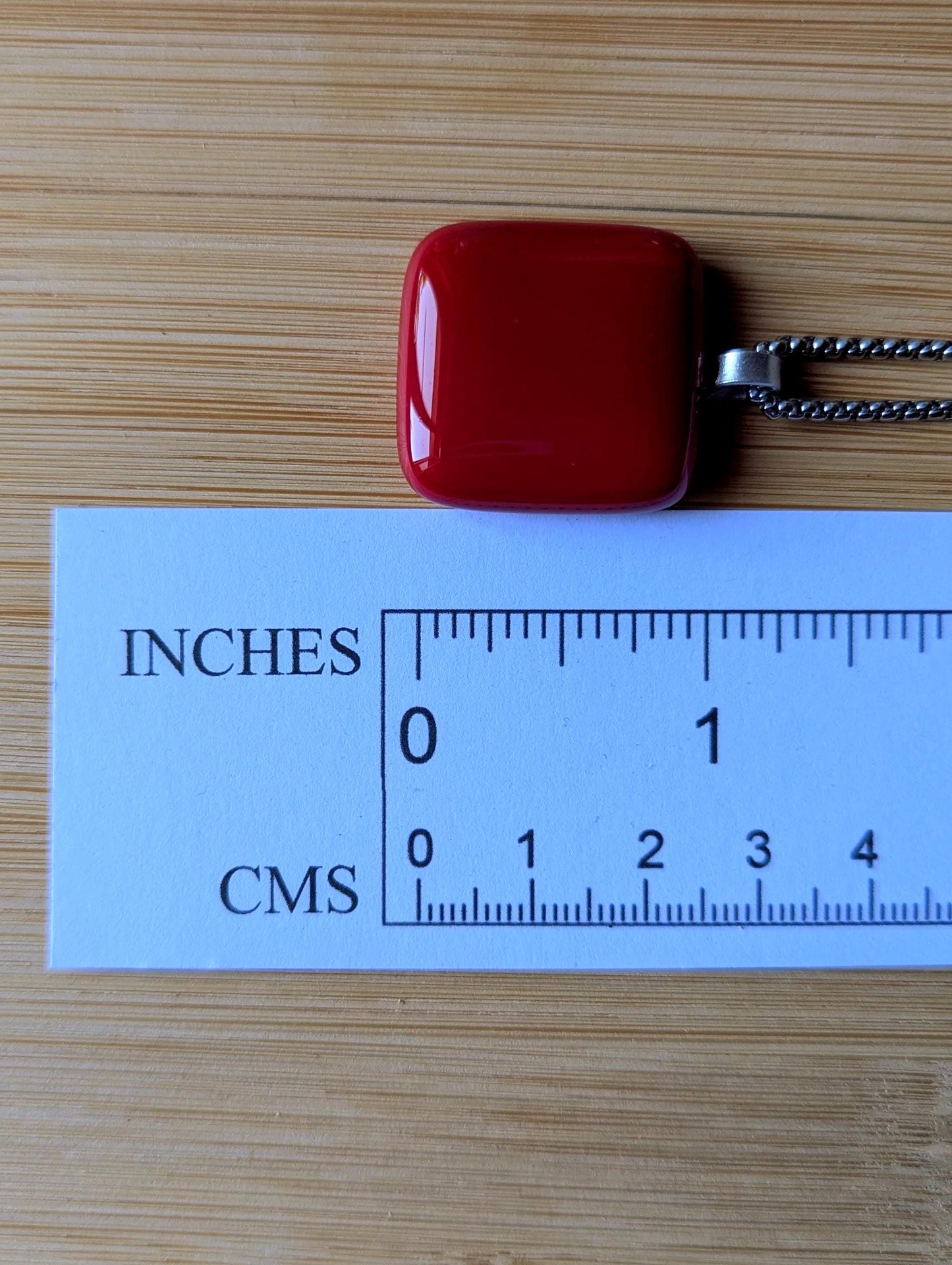 Handcrafted cherry red fused glass pendant with necklace and gift box