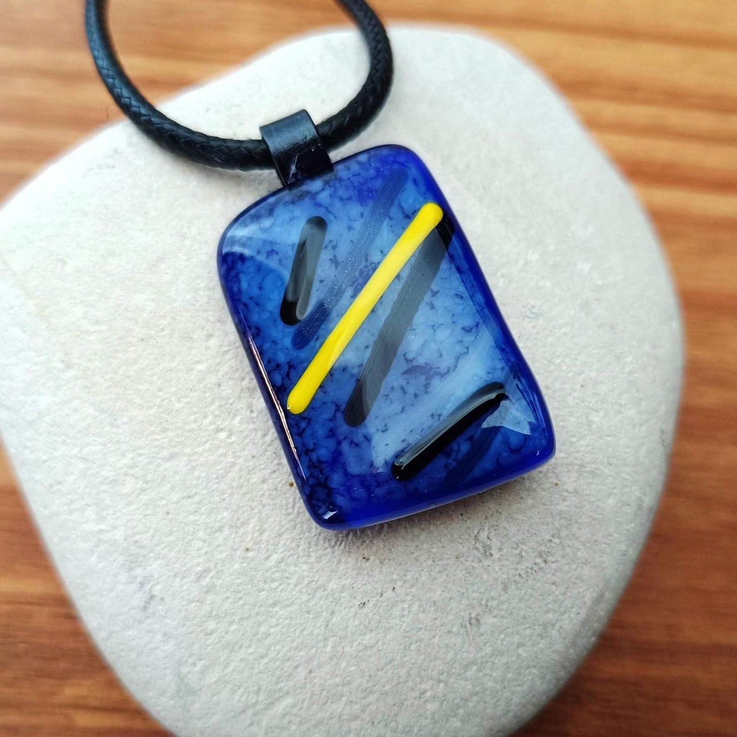 blue black and yellow fused glass necklace handmade with cord