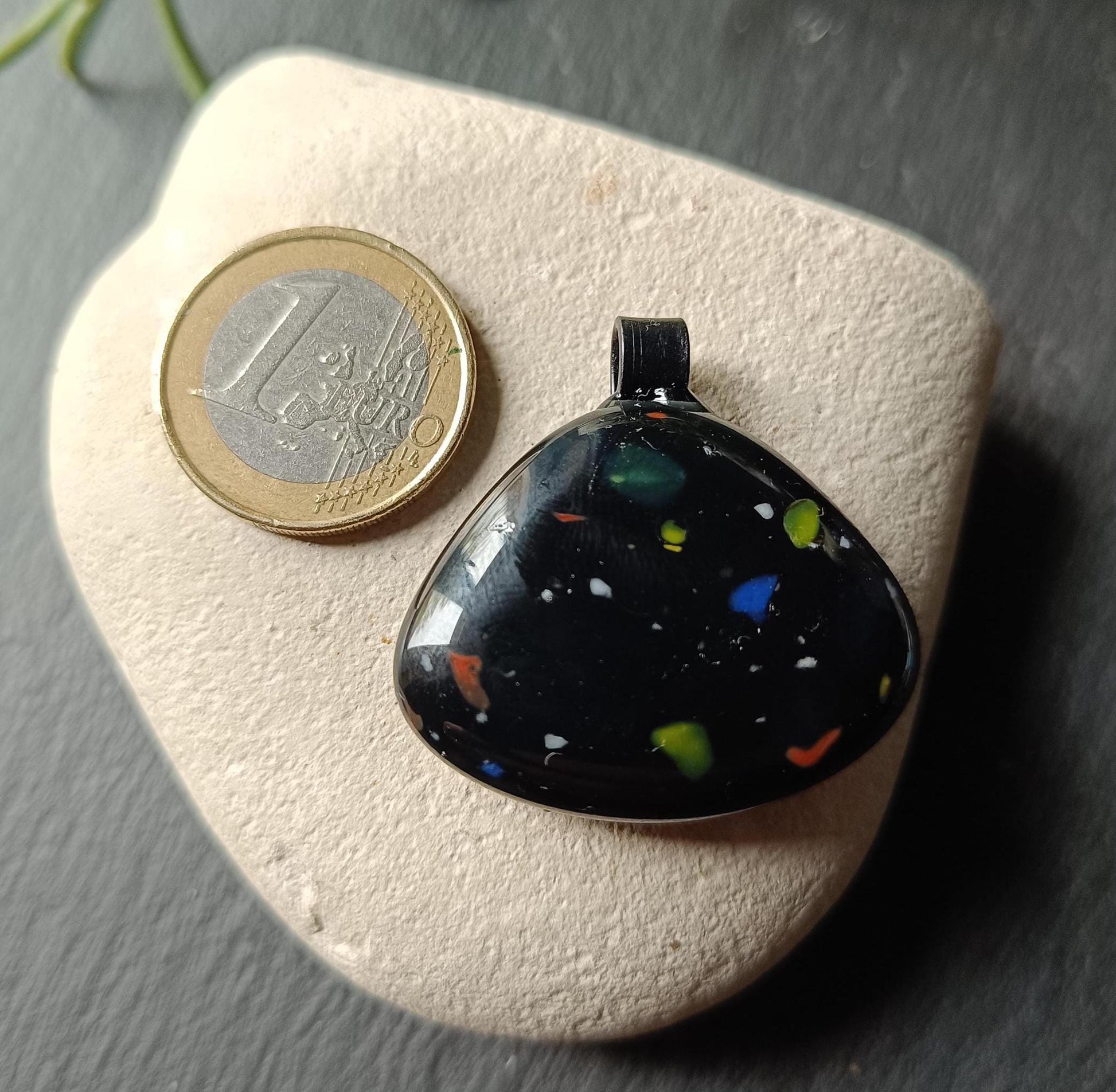 Handcrafted speckled black glass necklace pendant, created from an old marble