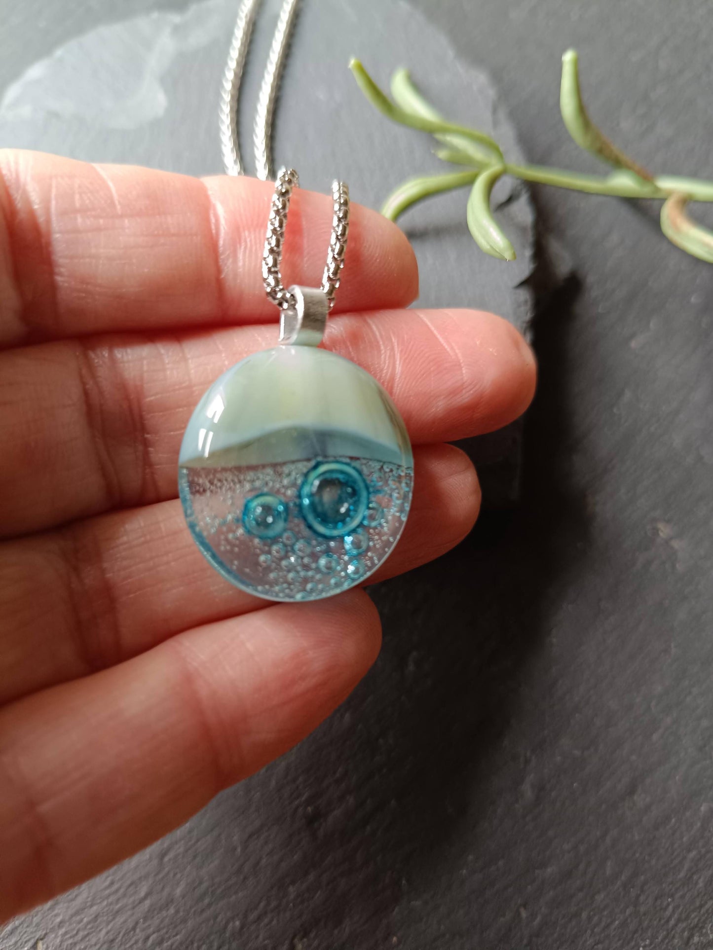 Blue bubble necklace: round fused glass pendant with aqua gradient and bubbles on a silver chain; one-of-a-kind handmade jewellery.