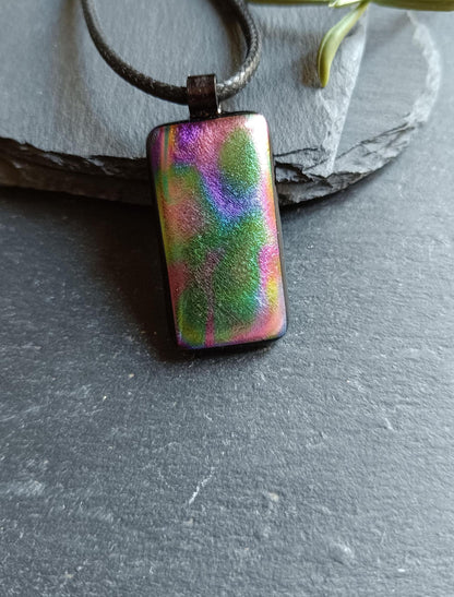 Dichroic fused glass pendant on black cord necklace; rainbow necklace with iridescent hues; artisan handmade jewellery gift.