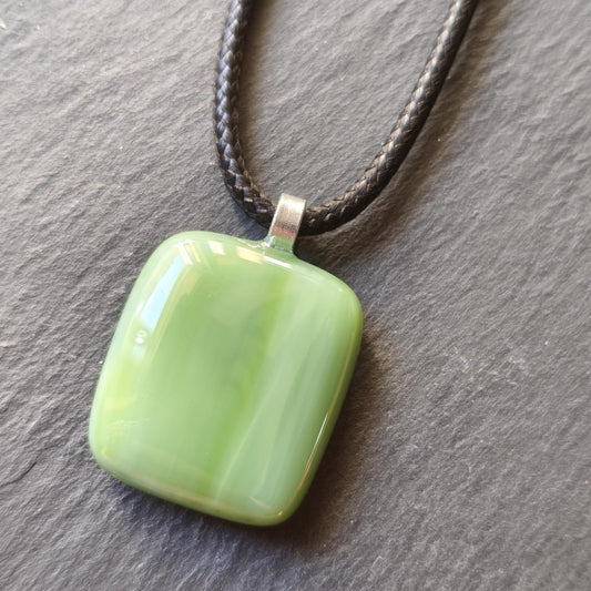 Handcrafted fused green glass pendant with cord necklace