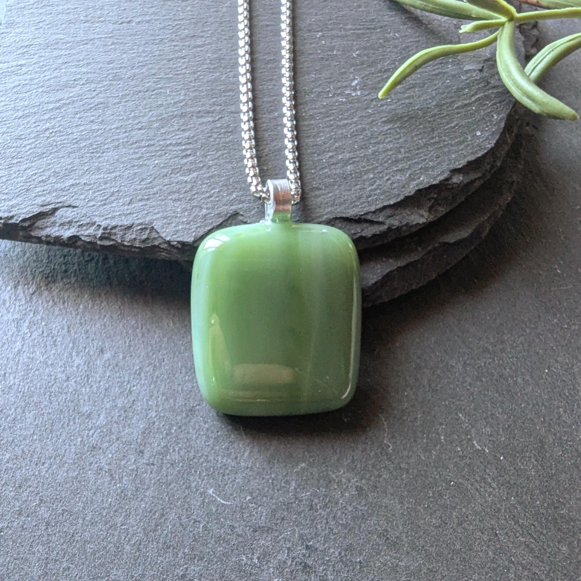 Handcrafted fused green glass pendant with cord necklace