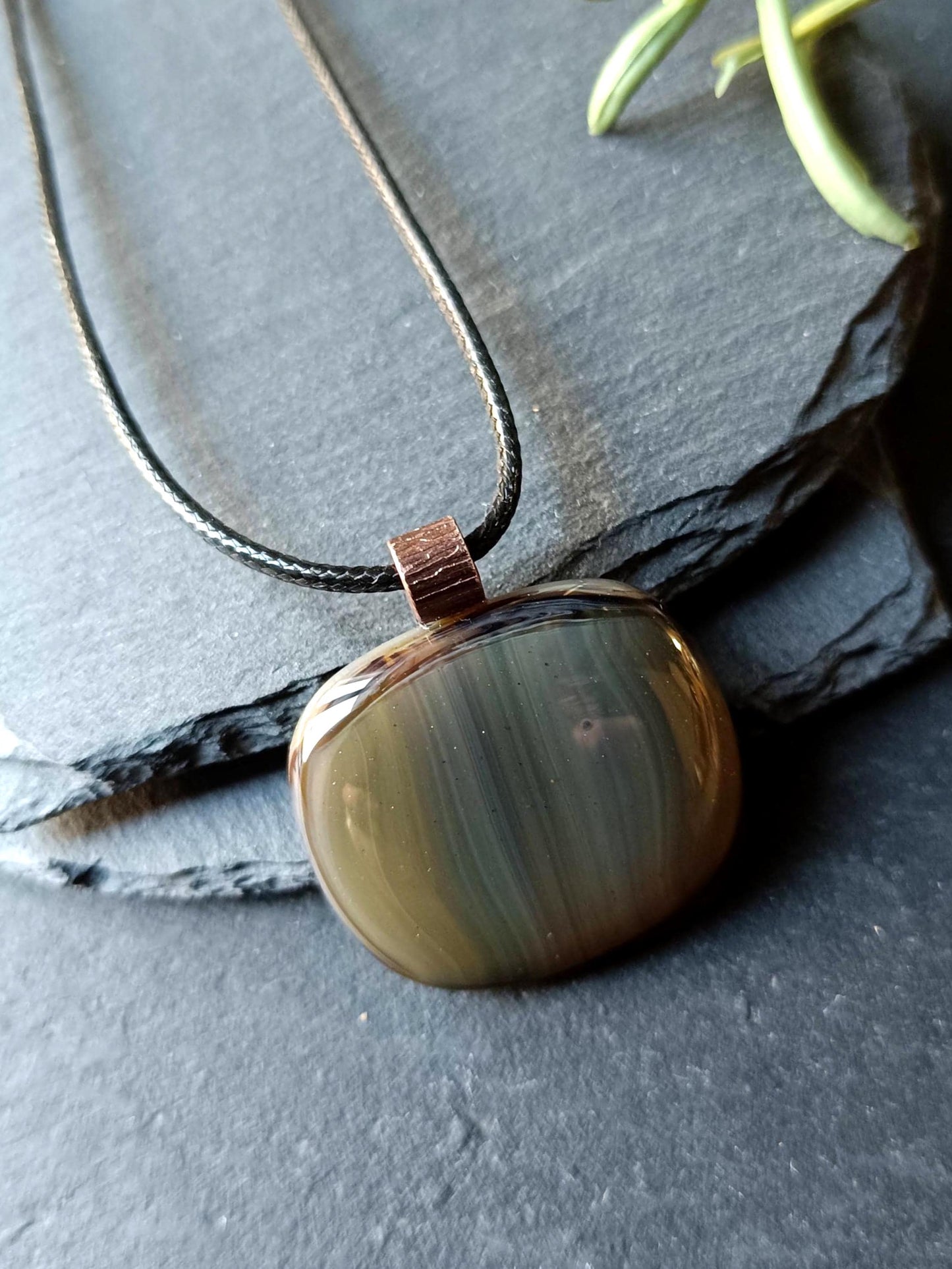 Fused glass pendant necklace with blue-green striped pendant, copper bail on black cord—artisan handmade jewellery, gift.