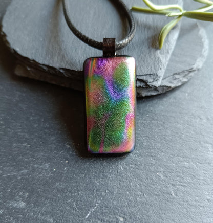 Dichroic fused glass pendant on black cord necklace; rainbow necklace with iridescent hues; artisan handmade jewellery gift.