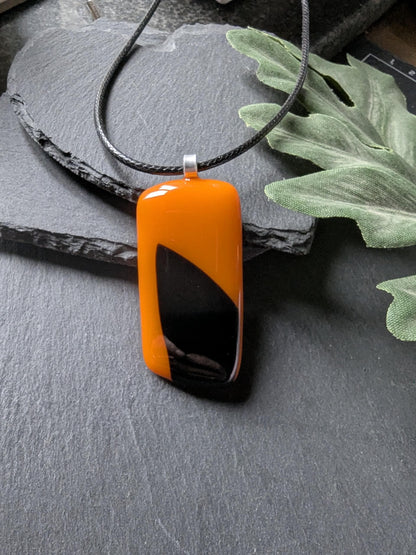 Orange and black fused glass pendant necklace, artisan handmade jewellery