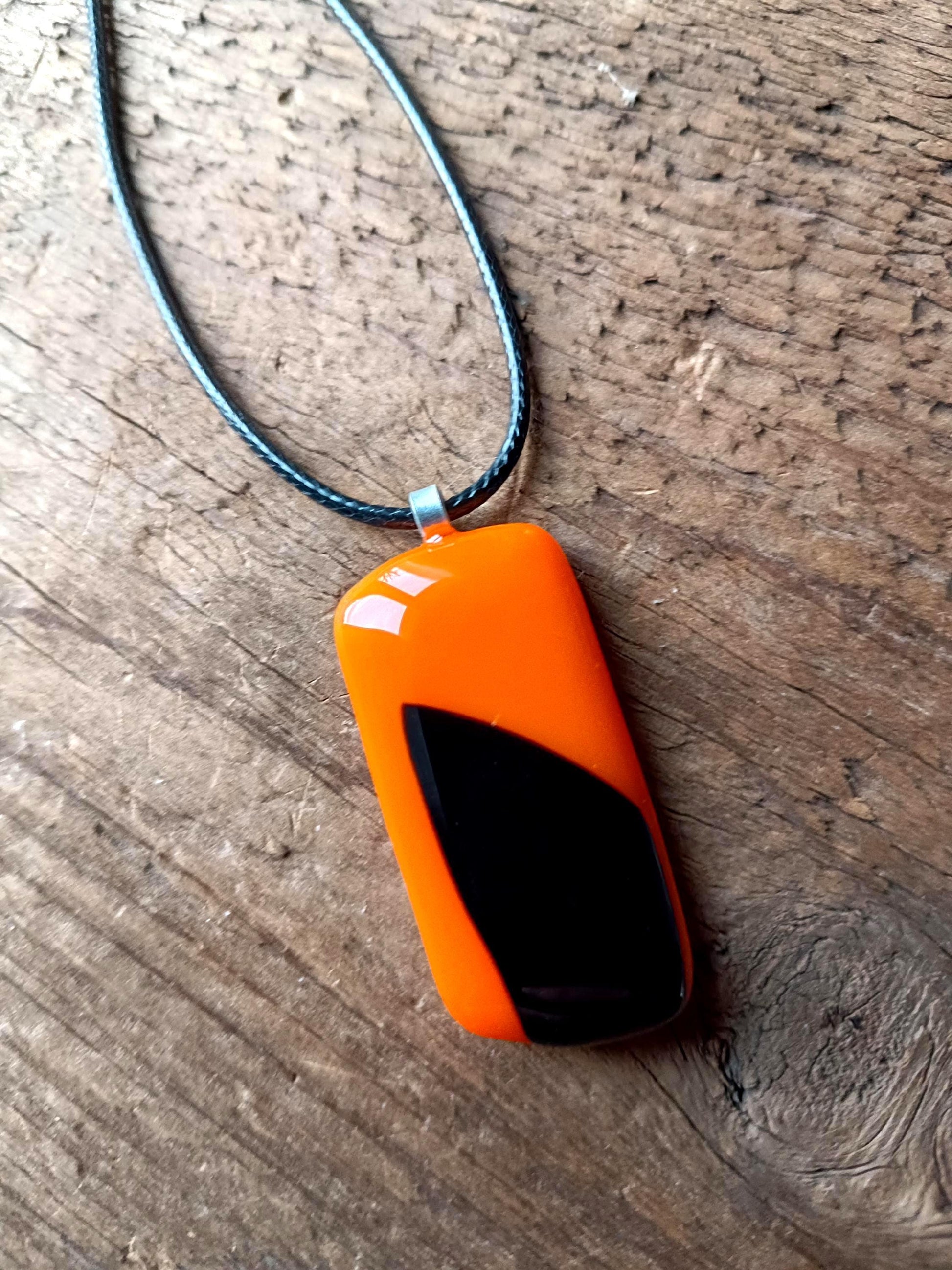 Orange and black fused glass pendant necklace, artisan handmade jewellery