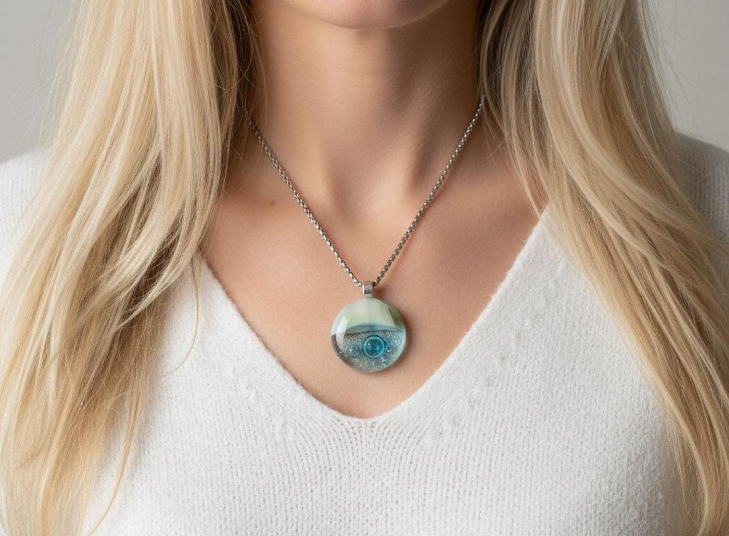 Blue bubble necklace: round fused glass pendant with aqua gradient and bubbles on a silver chain; one-of-a-kind handmade jewellery.