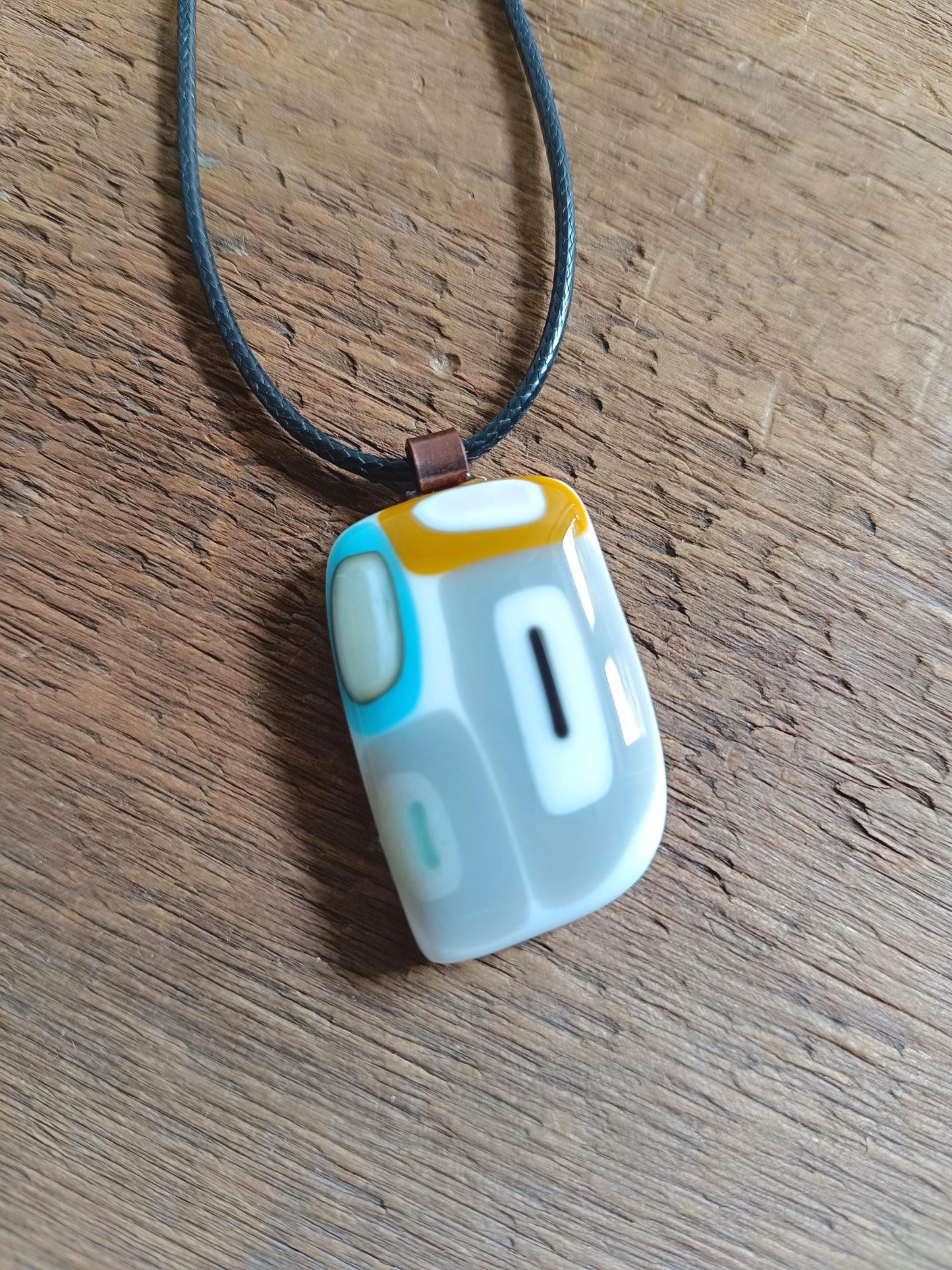 A one of a kind handmade fused glass necklace – no two pieces will ever be the same.
