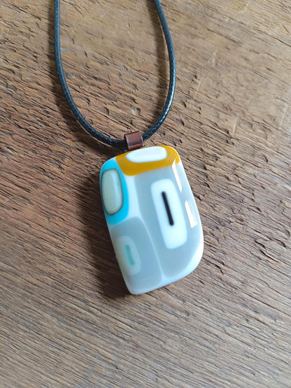A one of a kind handmade fused glass necklace – no two pieces will ever be the same.