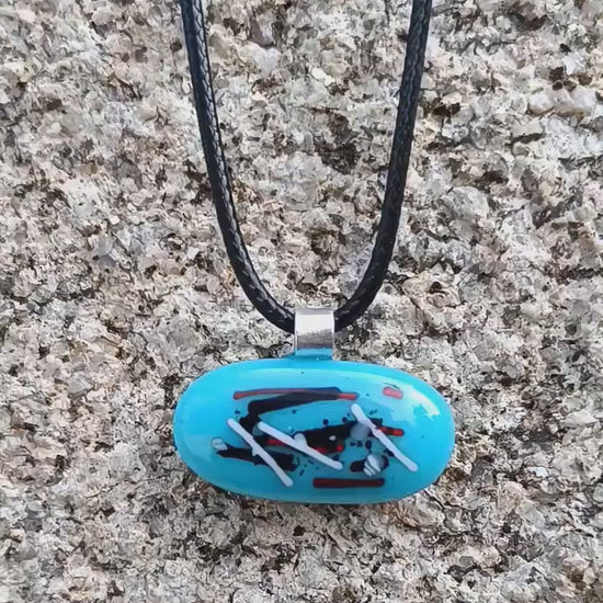 Handmade blue abstract fused glass pendant with cord necklace